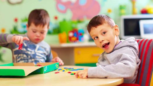 Cute Kids with Special Needs Playing — Disability Support in Wollongong, NSW