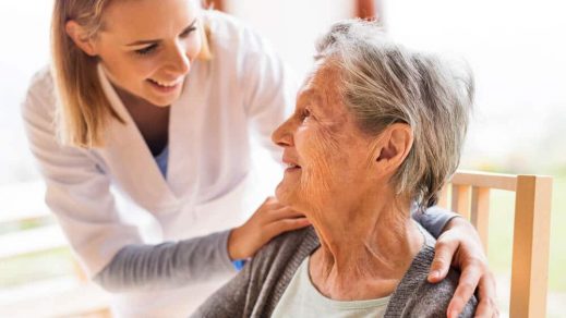 Caregiver and Elderly Woman — Disability Support in Wollongong, NSW