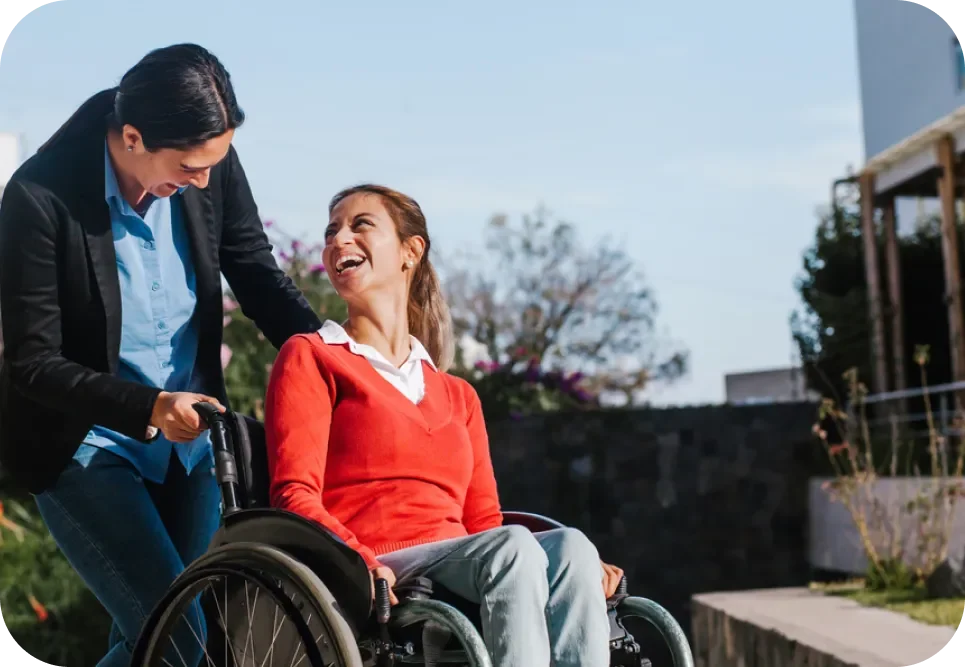 Happy lady on wheelchair — Disability Support in Wollongong, NSW